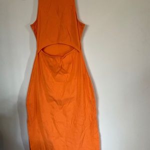 Orange long body con dress with cut out.